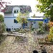 Aussen Terrasse und Hausrückseite